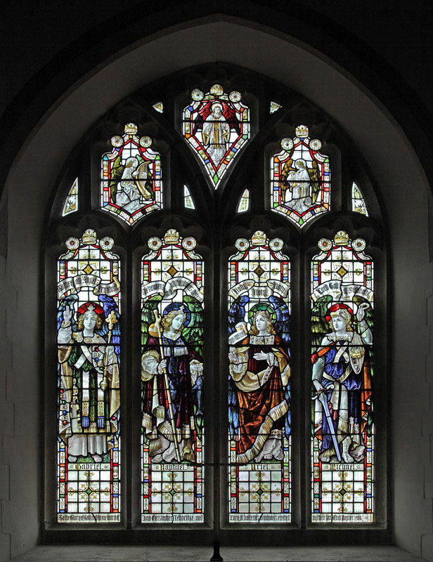 Stained glass window by Percy Bacon & Brothers, depicting the Archangels Gabriel, Raphael, Uriel and Michael, St Petroc's Church, Egloskerry, Cornwall.